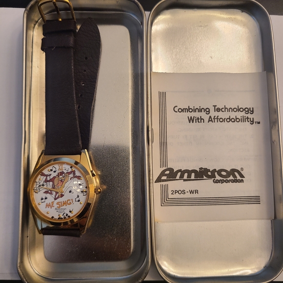 Armitron Gold and Black Watch with Cartoon Dial - Picture 1 of 4